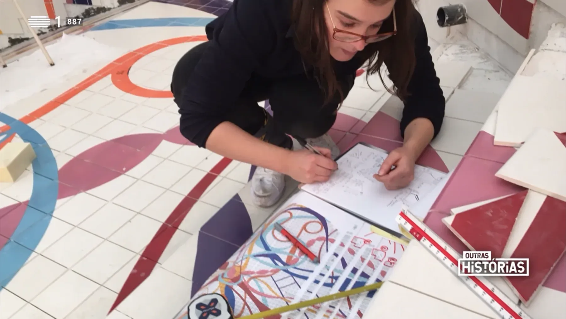 Susana Cereja working on a large-scale drawing in the studio.